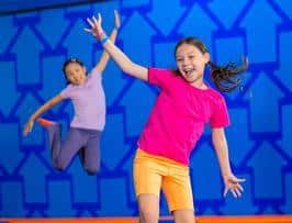 Two kids jumping at Sky Zone for BOGO January
